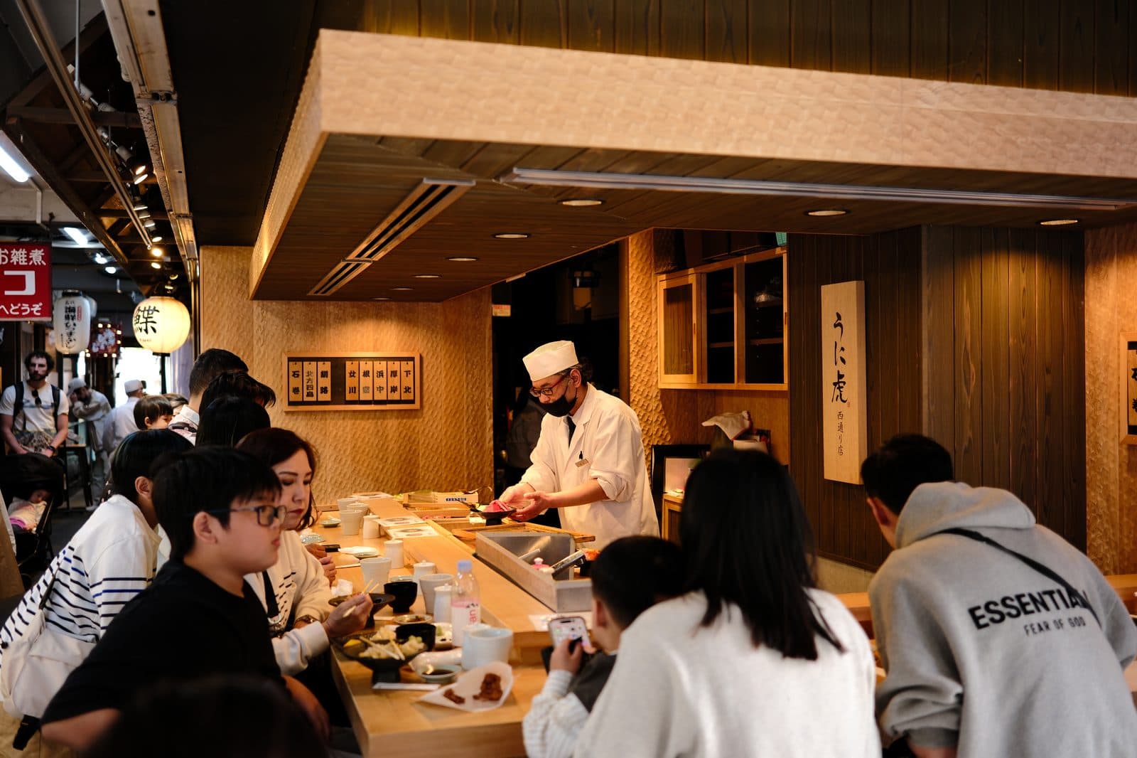 a small sushi counter behind the market